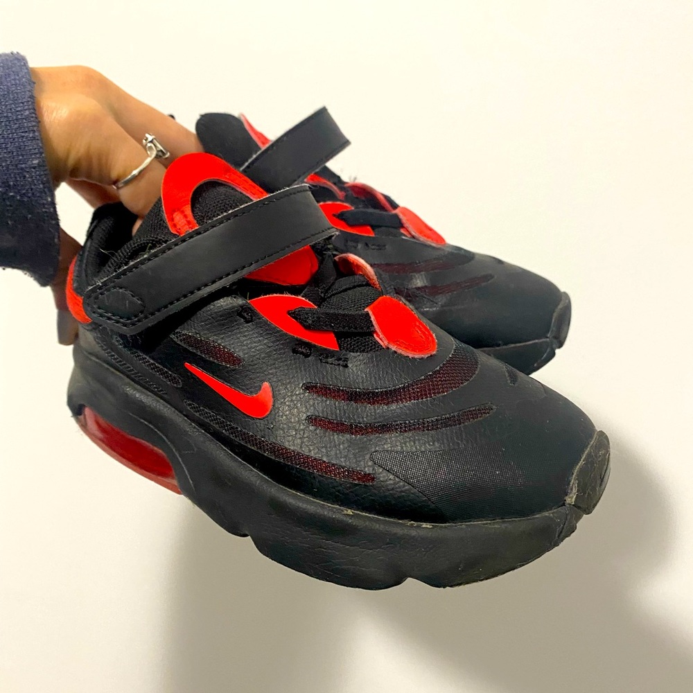 Kids red and black Nikes